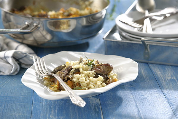 Foto de Arroz con setas, confit de pato y foie