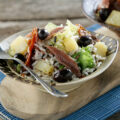 Ensalada de arroz con queso manchego y anchoas