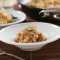 Arroz caldoso con calamares, vieiras y gambas