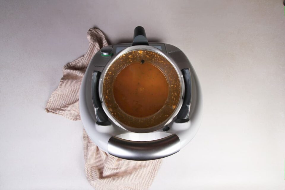 Agregar el fumet y la tinta de calamar