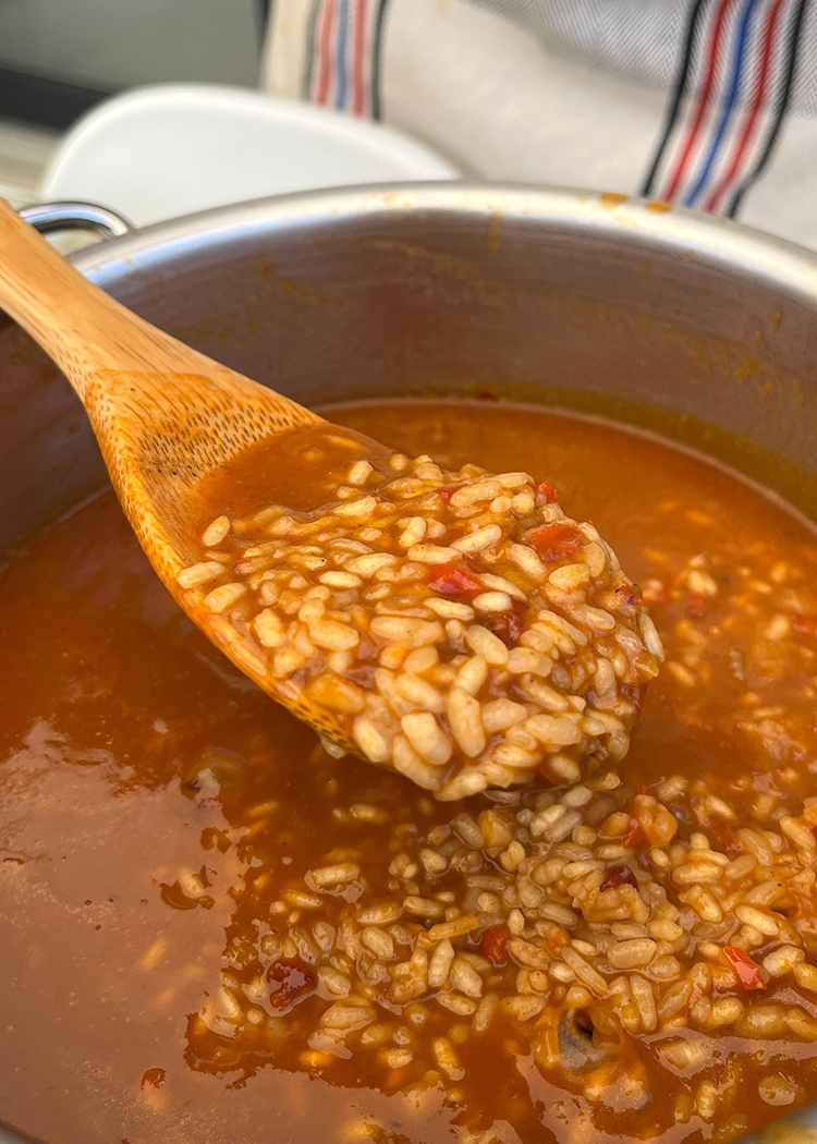 remover para arroz meloso con pulpo y gambas